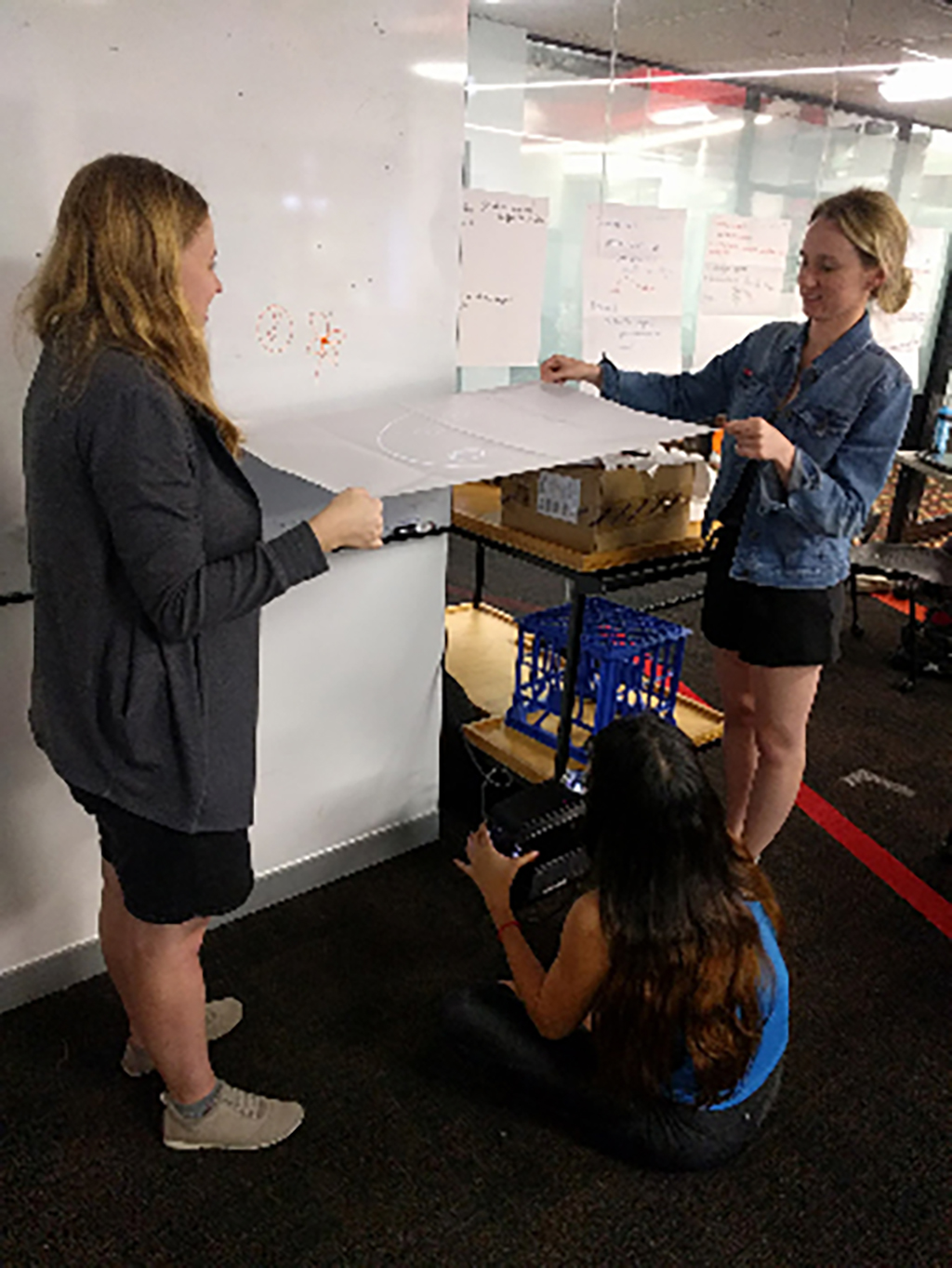 Image of team testing the projection for the Orbuculum